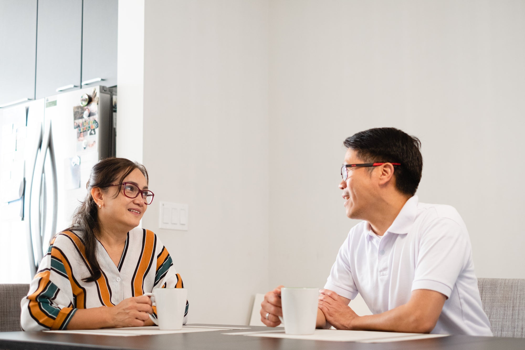 Couple talking at home